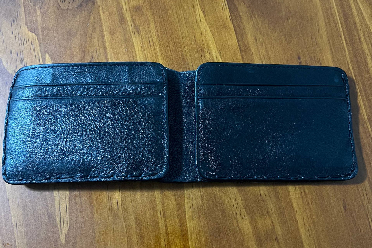 Gloomy wallet, Genuine leather, 8 card slots.
