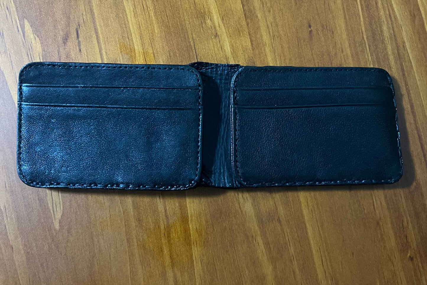 Gloomy wallet, Genuine leather, 8 card slots.