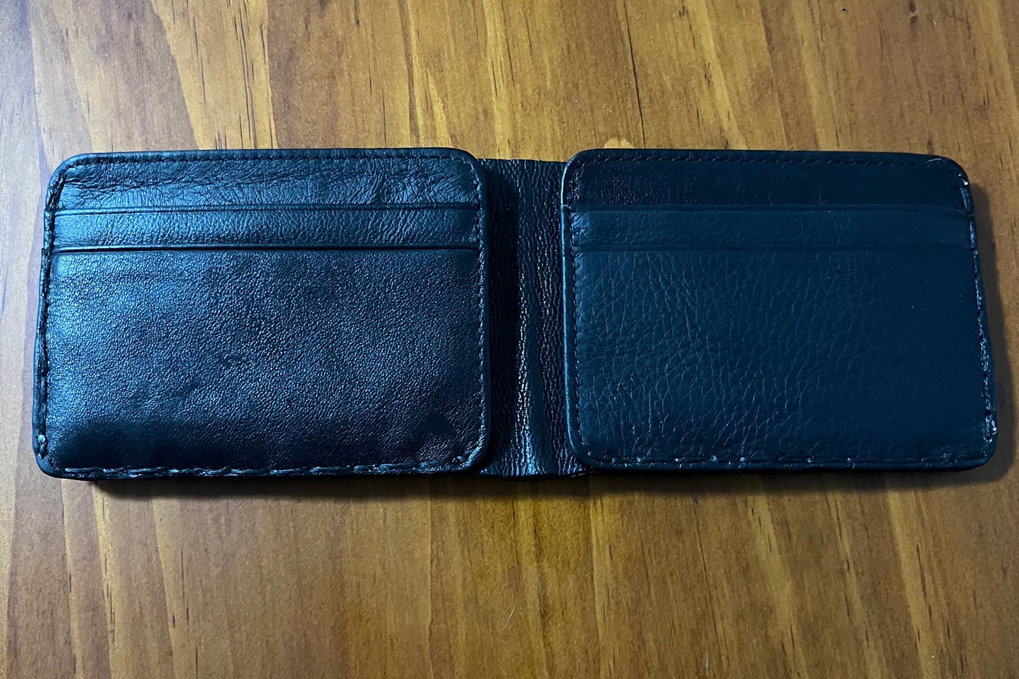 Gloomy wallet, Genuine leather, 8 card slots.